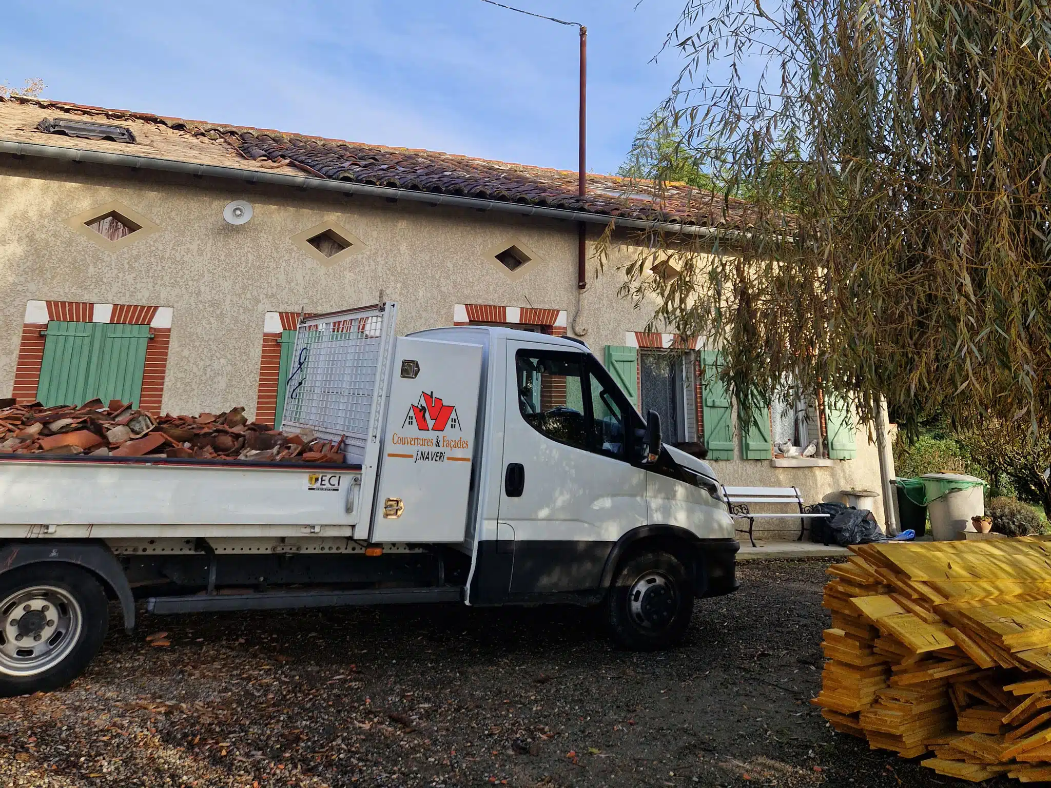 Camion de l'entreprise devant une maison à Quint-Fonsegrives