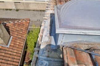 Bord de toit et habillage zinc repris sur un immeuble à Toulouse