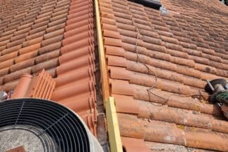 Toiture d'immeuble avec ventilation en toiture à Toulouse