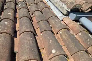 Rive et bande de zinc en bordure de versant à Pibrac